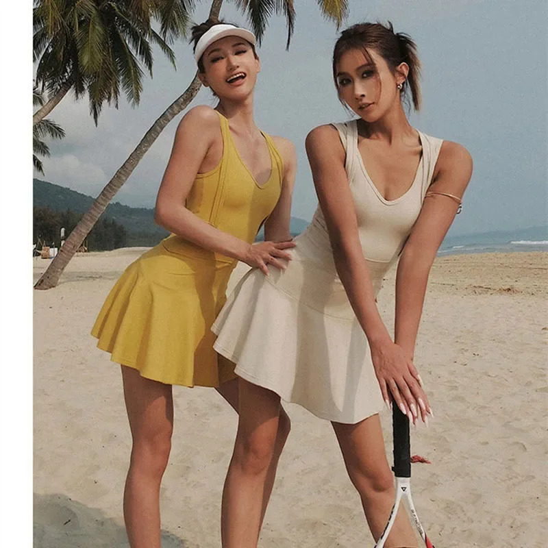 Badminton Queen - ชุดเทนนิสหญิงแขนกุดชุดกีฬาการฝึกอบรมการวิ่งออกกำลังกายกระโปรงสั้นกอล์ฟแบดมินตันชุดวอร์มกระโปรงโยคะแบบมีฟองน้ำ NM33